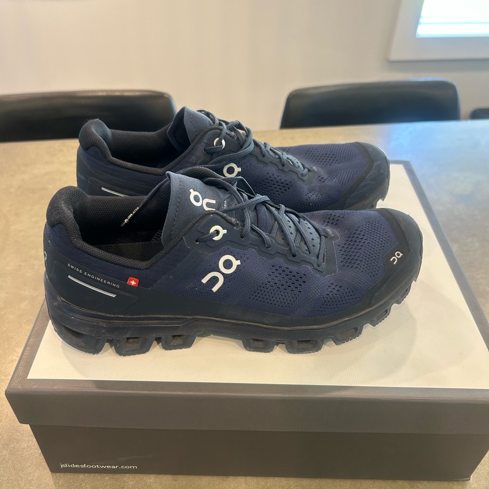 On Running womans Navy Athletic Shoes.